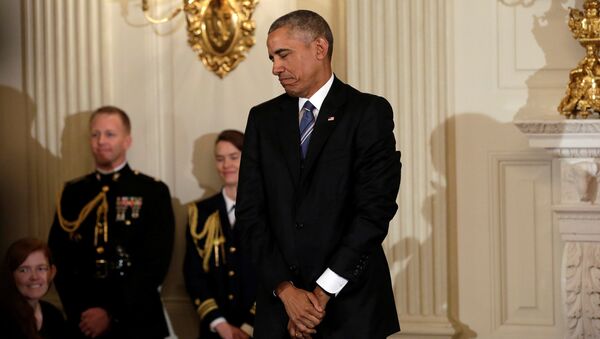 U.S. President Barack Obama reacts after presenting the Presidential Medal of Freedom to Vice President Joe Biden (not pictured) in the State Dining Room of the White House in Washington, U.S., January 12, 2017 - Sputnik International