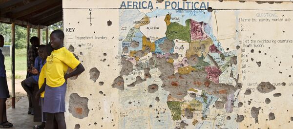 Students line up outside a classroom with a map of Africa on its wall, in Yei, in southern South Sudan (File) Students line up outside a classroom with a map of Africa on its wall, in Yei, in southern South Sudan (File) - Sputnik International