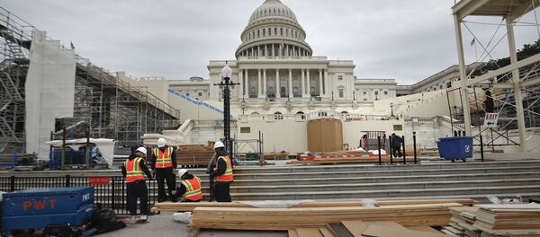 Construction continues on the Inaugural platform in preparation for the Inauguration and swearing-in ceremonies for President-elect Donald Trump, Thursday, Dec. 8, 2016, on the Capitol steps in Washington - Sputnik International