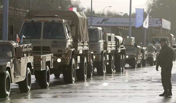 U.S. Army vehicles cross the Polish border in Olszyna, Poland, Thursday, Jan. 12, 2017 heading for their new base in Zagan U.S. Army vehicles cross the Polish border in Olszyna, Poland, Thursday, Jan. 12, 2017 heading for their new base in Zagan - Sputnik International