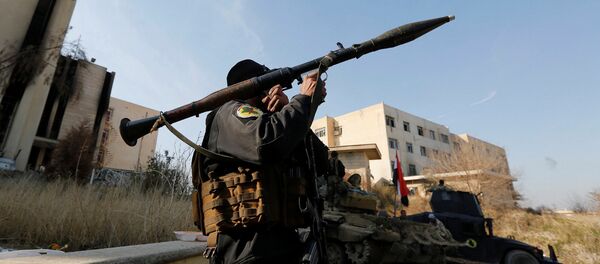A member of Iraqi Special Operations Forces (ISOF) carries a rocket launcher at the University of Mosul during a battle with Islamic State militants, in Mosul, Iraq, January 14, 2017 A member of Iraqi Special Operations Forces (ISOF) carries a rocket launcher at the University of Mosul during a battle with Islamic State militants, in Mosul, Iraq, January 14, 2017 - Sputnik International