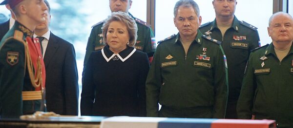 Center, from left: Valentina Matviyenko, chairman of the Russian Federation Council, and Army General Sergei Shoigu, Russian defense minister, during the farewell ceremony for the victims of the Tu-154 crash over the Black Sea, at the Federal Military Memorial Cemetery in the Moscow region. Center, from left: Valentina Matviyenko, chairman of the Russian Federation Council, and Army General Sergei Shoigu, Russian defense minister, during the farewell ceremony for the victims of the Tu-154 crash over the Black Sea, at the Federal Military Memorial Cemetery in the Moscow region. - Sputnik International