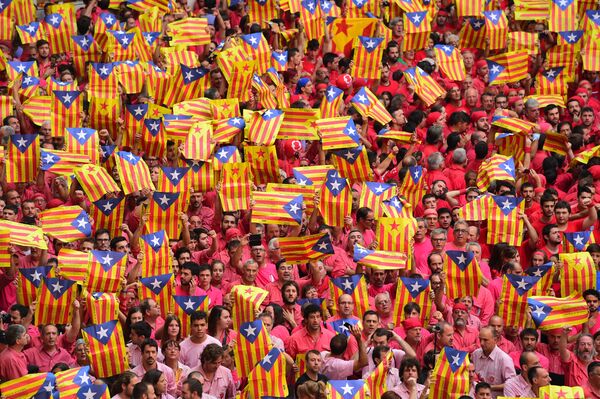 People showing 'Esteladas' (pro-independence Catalan flags) during the XXVI human towers, or 'castells', competetion in Tarragona on October 2, 2016. People showing 'Esteladas' (pro-independence Catalan flags) during the XXVI human towers, or 'castells', competetion in Tarragona on October 2, 2016. - Sputnik International