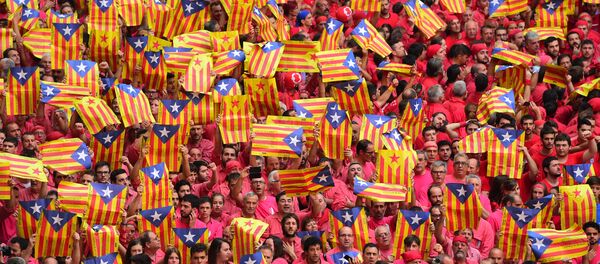 People showing 'Esteladas' (pro-independence Catalan flags) during the XXVI human towers, or 'castells', competetion in Tarragona on October 2, 2016. People showing 'Esteladas' (pro-independence Catalan flags) during the XXVI human towers, or 'castells', competetion in Tarragona on October 2, 2016. - Sputnik International