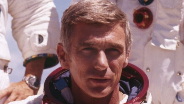 U.S. American navy commander and astronaut for the upcoming Apollo 17, Eugene Cernan, is pictured in his space suit, 1972. - Sputnik International