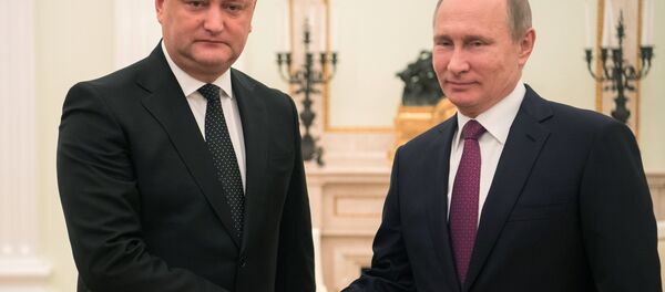 Russian President Vladimir Putin and Moldova's President Igor Dodon meet in Moscow on January 17, 2017 - Sputnik International