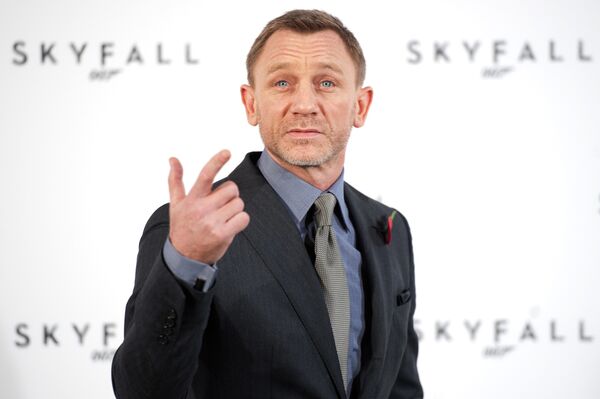 British actor Daniel Craig gestures as he poses for photographers at a photocall to announce the start of production of the 23rd film in the James Bond series; 'Skyfall', in central London on November 3, 2011. British actor Daniel Craig gestures as he poses for photographers at a photocall to announce the start of production of the 23rd film in the James Bond series; 'Skyfall', in central London on November 3, 2011. - Sputnik International