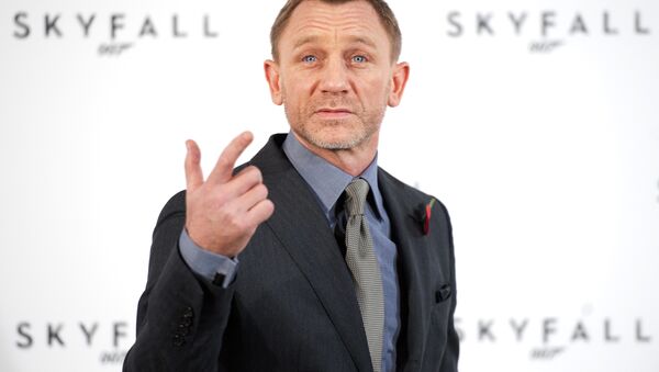 British actor Daniel Craig gestures as he poses for photographers at a photocall to announce the start of production of the 23rd film in the James Bond series; 'Skyfall', in central London on November 3, 2011. - Sputnik International
