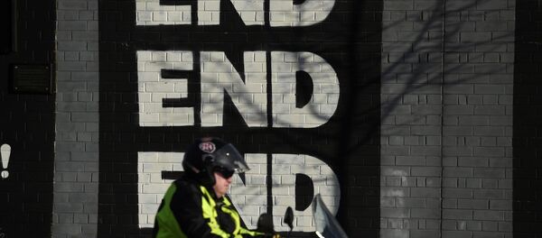 A motorbike is driven past a mural on the Falls Road a day after Northern Ireland's Deputy First Minister Martin McGuinness resigned, throwing the devolved joint administration into crisis, in Belfast Northern Ireland, January 10, 2017. - Sputnik International