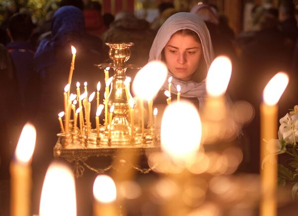 Cold Hands, Warm Hearts: Russians Brave the Cold to Celebrate Orthodox Epiphany - Sputnik International