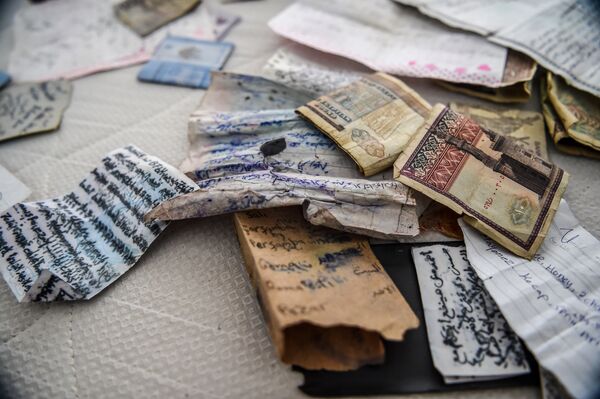 A picture taken on January 17, 2017 shows pieces of paper and money in the apartment where the main suspect in the Reina nightclub rampage was arrested by Turkish police the night before, in Istanbul. A picture taken on January 17, 2017 shows pieces of paper and money in the apartment where the main suspect in the Reina nightclub rampage was arrested by Turkish police the night before, in Istanbul. - Sputnik International