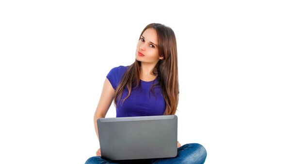 A teenage girl using a laptop - Sputnik International