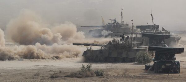 Pakistani army tanks advance during a military exercise at a trategic area along the border with India, in Khairpure Tamay Wali in Bahawalpur district on November 16, 2016 Pakistani army tanks advance during a military exercise at a trategic area along the border with India, in Khairpure Tamay Wali in Bahawalpur district on November 16, 2016 - Sputnik International