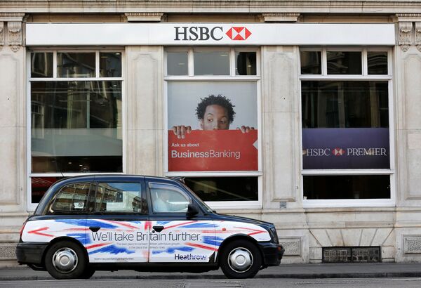 A taxi drives past a branch of HSBC bank in London, Britain, February 9, 2015. A taxi drives past a branch of HSBC bank in London, Britain, February 9, 2015. - Sputnik International