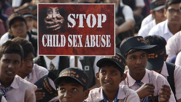 Indian schoolchildren participate in an awareness campaign rally to mark World Day for the Prevention of Child Abuse and Violence against Children, in Hyderabad, India, Wednesday, Nov. 19, 2014 - Sputnik International