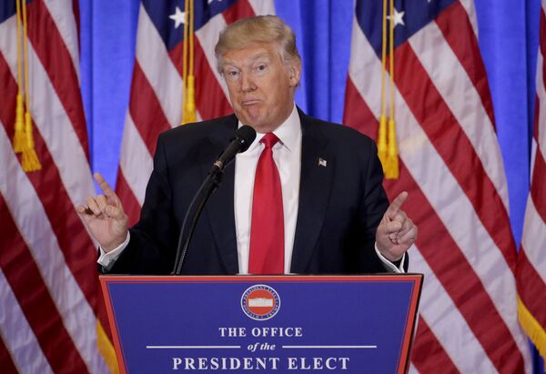 FILE - In this file photo dated Wednesday, Jan. 11, 2017, President-elect Donald Trump speaks during his first news conference as President-elect, in New York FILE - In this file photo dated Wednesday, Jan. 11, 2017, President-elect Donald Trump speaks during his first news conference as President-elect, in New York - Sputnik International