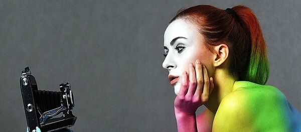 A woman taking a selfie A woman taking a selfie - Sputnik International