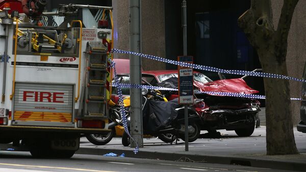 The wreckage of a car is seen as police cordoned off Bourke Street mall, after a car hit pedestrians in central Melbourne, Australia, January 20, 2017 - Sputnik International