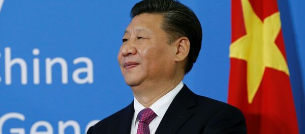 Chinese President Xi Jinping watches during a gift handover ceremony at the United Nations European headquarters in Geneva, Switzerland, January 18, 2017 Chinese President Xi Jinping watches during a gift handover ceremony at the United Nations European headquarters in Geneva, Switzerland, January 18, 2017 - Sputnik International