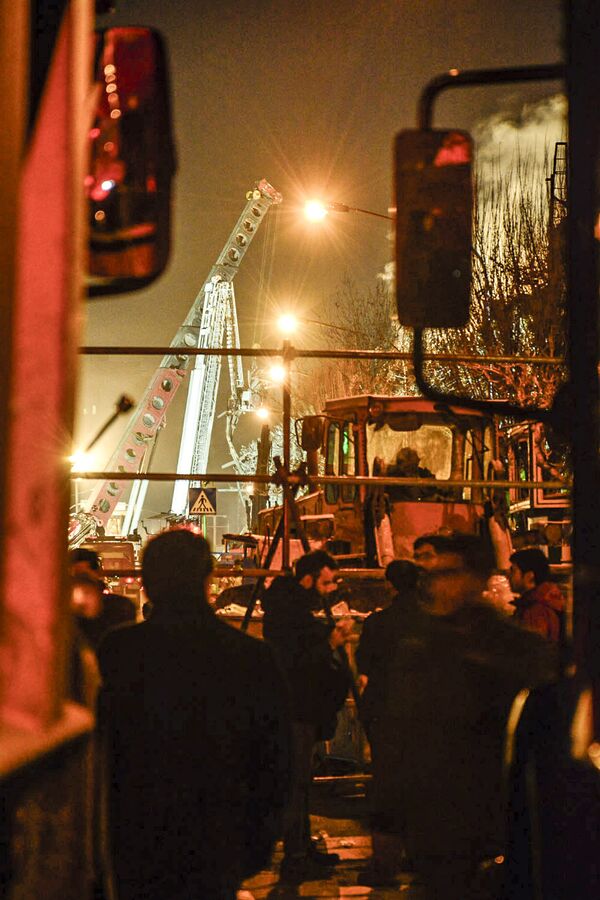 Rescue Workers Sift Through Wreckage of Tehran's Towering Inferno for Survivors - Sputnik International