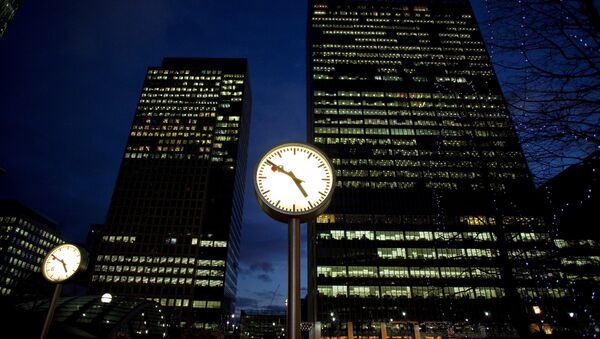 A view of offices at the financial district of Canary Wharf in London, Britain at dusk January 13, 2009 - Sputnik International