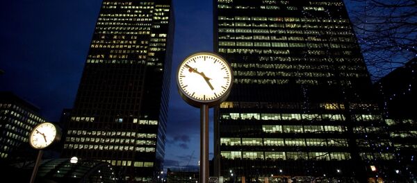 A view of offices at the financial district of Canary Wharf in London, Britain at dusk January 13, 2009 - Sputnik International