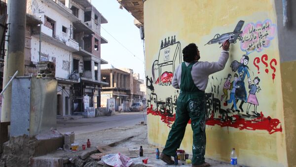 Syrian artist Aziz al-Asmar works on a mural depicting the war in his country ahead of the start of the Astana peace talks, on January 19, 2017, in the Syrian rebel-held town of Binnish, on the outskirts of Idlib - Sputnik International