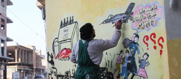 Syrian artist Aziz al-Asmar works on a mural depicting the war in his country ahead of the start of the Astana peace talks, on January 19, 2017, in the Syrian rebel-held town of Binnish, on the outskirts of Idlib Syrian artist Aziz al-Asmar works on a mural depicting the war in his country ahead of the start of the Astana peace talks, on January 19, 2017, in the Syrian rebel-held town of Binnish, on the outskirts of Idlib - Sputnik International