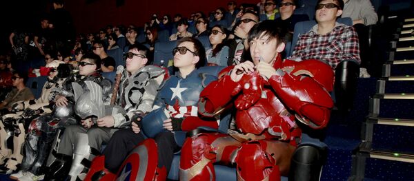 A group of fans dressed in homemade replica armour of Avengers: Age of Ultron movie characters, Iron Man, Captain America and Thor, watch the film in a theatre in Changchun, Jilin province, China on May 16, 2015 A group of fans dressed in homemade replica armour of Avengers: Age of Ultron movie characters, Iron Man, Captain America and Thor, watch the film in a theatre in Changchun, Jilin province, China on May 16, 2015 - Sputnik International