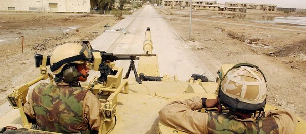 Alex Matheson, left, a member of the Desert Rats with his Challenger II tank man an operational post in Basra, southern Iraq, Friday April 4, 2003 Alex Matheson, left, a member of the Desert Rats with his Challenger II tank man an operational post in Basra, southern Iraq, Friday April 4, 2003 - Sputnik International