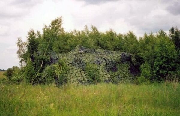 The MKT-4L, seen here deployed covering what is presumed to be a military vehicle. The MKT-4L, seen here deployed covering what is presumed to be a military vehicle. - Sputnik International