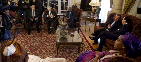 Libyan Foreign Minister, Mohamed Taher Siala, top center, attends a ministerial meeting of countries neighboring Libya which include Egypt, Tunisia, Algeria, Sudan, Niger and Chad, as well as United Nations envoy, Martin Kobler, third right, in Cairo, Egypt, Saturday, Jan. 21, 2017 Libyan Foreign Minister, Mohamed Taher Siala, top center, attends a ministerial meeting of countries neighboring Libya which include Egypt, Tunisia, Algeria, Sudan, Niger and Chad, as well as United Nations envoy, Martin Kobler, third right, in Cairo, Egypt, Saturday, Jan. 21, 2017 - Sputnik International