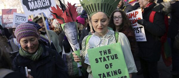 Demonstrators take part in the Women's March on London, following the Inauguration of U.S. President Donald Trump, in London, Saturday Jan. 21, 2016. Demonstrators take part in the Women's March on London, following the Inauguration of U.S. President Donald Trump, in London, Saturday Jan. 21, 2016. - Sputnik International