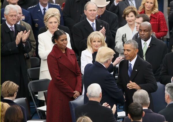 President Obama greets President-elect Donald Trump as former president Bill Clinton, his wife Hillary, and former President George W Bush and his wife Laura look on at the inauguration ceremonies swearing in Donald Trump as the 45th president of the United States on the West front of the U.S. Capitol in Washington, U.S., January 20, 2017 President Obama greets President-elect Donald Trump as former president Bill Clinton, his wife Hillary, and former President George W Bush and his wife Laura look on at the inauguration ceremonies swearing in Donald Trump as the 45th president of the United States on the West front of the U.S. Capitol in Washington, U.S., January 20, 2017 - Sputnik International