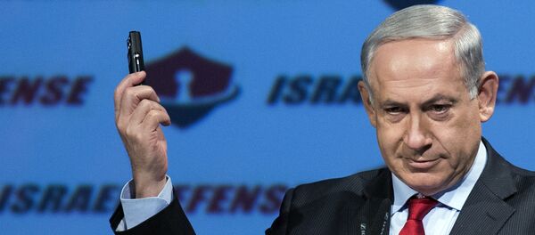 Israeli Prime Minister Benjamin Netanyahu shows a mobile phone (File) Israeli Prime Minister Benjamin Netanyahu shows a mobile phone (File) - Sputnik International