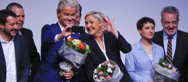 France's National Front leader Marine Le Pen and Netherlands' Party for Freedom (PVV) leader Geert Wilders take a Selfie during a European far-right leaders meeting to discuss about the European Union, in Koblenz, Germany, January 21, 2017 France's National Front leader Marine Le Pen and Netherlands' Party for Freedom (PVV) leader Geert Wilders take a Selfie during a European far-right leaders meeting to discuss about the European Union, in Koblenz, Germany, January 21, 2017 - Sputnik International