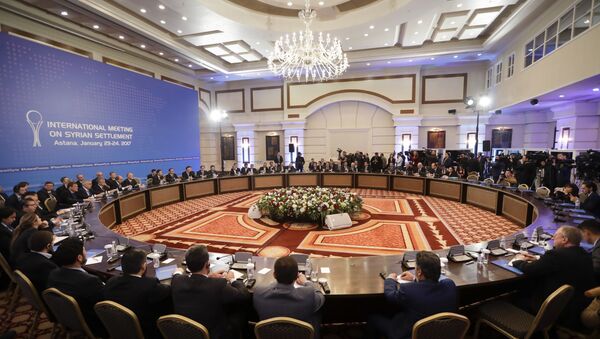 Delegations of Russia, Iran and Turkey hold talks on Syrian peace at a hotel in Astana, Kazakhstan, Monday, Jan. 23, 2017. - Sputnik International