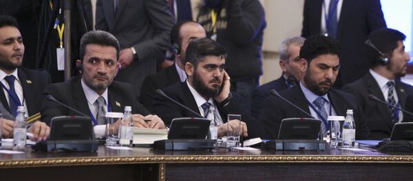 Mohammad Alloush (C), the head of the Syrian opposition delegation, attends Syria peace talks in Astana, Kazakhstan January 23, 2017. Mohammad Alloush (C), the head of the Syrian opposition delegation, attends Syria peace talks in Astana, Kazakhstan January 23, 2017. - Sputnik International