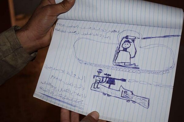 Drawings of children enslaved by Daesh found in Mosul Drawings of children enslaved by Daesh found in Mosul - Sputnik International