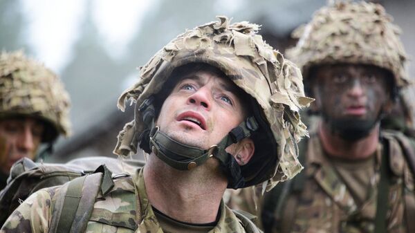 Royal British soldiers conduct the Urban Casualty Evacuation lane during the European Best Squad Competition at the 7th Army’s Joint Multinational Training Command’s, Grafenwoehr training area, Bavaria, Germany, Oct. 20, 2015.  - Sputnik International