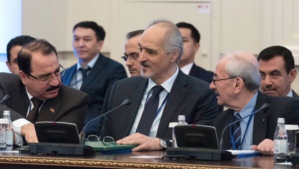Bashar Jaafari, center, Permanent Representative of the Syrian Arab Republic to the United Nations and head of the Syrian government delegation, at a meeting on Syria in Astana. - Sputnik International