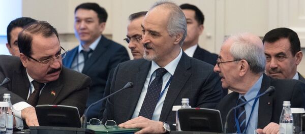Bashar Jaafari, center, Permanent Representative of the Syrian Arab Republic to the United Nations and head of the Syrian government delegation, at a meeting on Syria in Astana. - Sputnik International