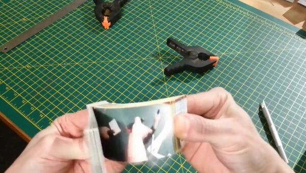 Flip book of a gif of me flipping through a gif that I printed into a flip book - Sputnik International