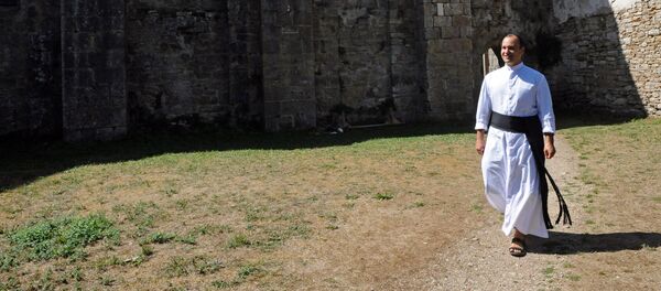 Father Guillaume Soury-Lavergne walks in the Benedictine abbey of Marcilhac-sur-Cele, in the Lot gorges, southern France. (File) - Sputnik International