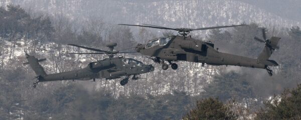 U.S. Apache helicopters take to the air during an aerial gunnery exercise at a military firing range in Pocheon, South Korea (File) U.S. Apache helicopters take to the air during an aerial gunnery exercise at a military firing range in Pocheon, South Korea (File) - Sputnik International