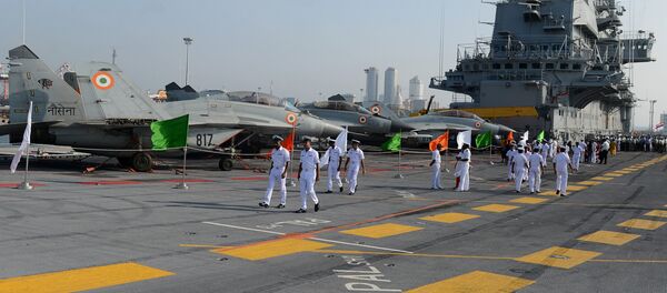 Naval personnel walk along India’s largest naval ship the INS Vikramaditya as she anchors in the Sri Lankan capital Colombo on January 21, 2016 Naval personnel walk along India’s largest naval ship the INS Vikramaditya as she anchors in the Sri Lankan capital Colombo on January 21, 2016 - Sputnik International