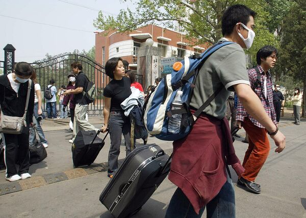 Students leave the Beijing Foreign Languages Institute (File) - Sputnik International
