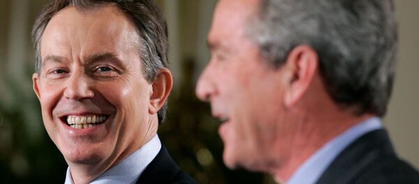 US President George W. Bush (R) and British Prime Minister Tony Blair attend a news conference in the East Room of the White House in Washington November 12, 2004. - Sputnik International