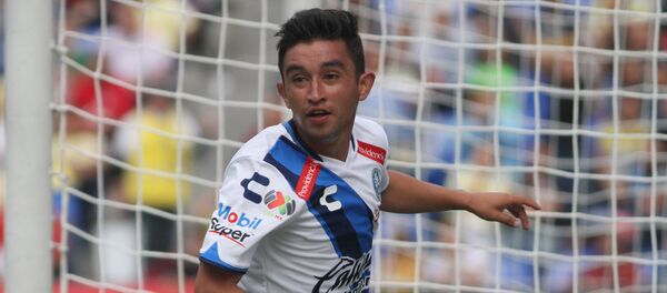 Christian Bermudez of Puebla celebrates his goal against America during their Mexican Apertura 2016 Tournament football match at the Cuauhtemoc stadium on August 21, 2016, in Puebla, Mexico - Sputnik International