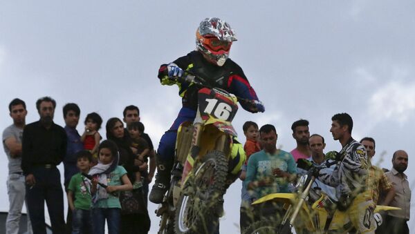 Female motocross at a racetrack near the village of Baraghan, some 19 miles (30 kilometers) west of the capital Tehran, Iran - Sputnik International